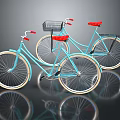 Two Light Blue Bicycles With Red Seats Black Front Basket And White Rims