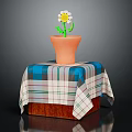 Small White Flower Plant in Orange Pot on Wooden Table with Blue Green Checkered Tablecloth