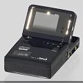 Black Portable VHS Video Player With Open Screen And Control Buttons For Household Use