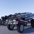 Unique Tracked Vehicle And Streamlined Race Car With Large Wheels And Mechanical Parts