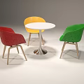 Modern Table and Chair Set With White Round Top Red Yellow Green Chairs Wooden Legs