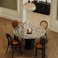 Round Dining Table Set With Marble Top Rattan Chairs And Wooden Herringbone Floor