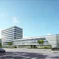 Modern Hospital Building with Green Roof Surrounded by Trees and Urban Roads
