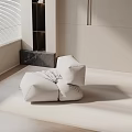 White Minimalist Lounge Chair In Modern Interior With Marble Accent Soft Lighting And Plush Cushions
