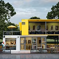 Two Story Yellow And White Container Building Café With Outdoor Seating Trees And Tables