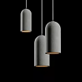 Three Gray Cylindrical Pendant Lights Hanging On Black Background With Bottom Light Source 3d model