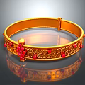 Elegant Golden Bangle Adorned With Red Gemstones And Intricate Patterns Shiny Design