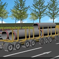 Yellow Heavy-Duty Transport Truck Carrying Large Concrete Pipes on the Road with Trees