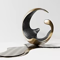 Modern Metallic Sculpture With Curved Design Textured Black Surface And Dripping Golden Base