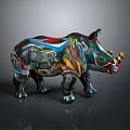 Colorful Rhinoceros Sculpture With Intricate Decorative Patterns And Vibrant Hues