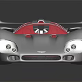 Sleek Race Car With Streamlined Design Red Interior And Gold Wheels