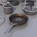 Stainless Steel Kitchenware with Baking Pans Pots Bowls Lids Measuring Cups Neatly Arranged