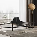 Modern Black Leather Chaise Lounge by Window with Floor Lamp and Green Plant