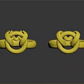 Elegant Gold Rings With Intricate Knot Design And Shiny Surface