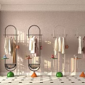 Modern Clothing Racks with Green and Orange Bases and Small Shelves for Hanging Clothes and Bags