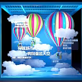Colorful Striped Hot Air Balloons Flying With Clouds In Blue Sky Over City