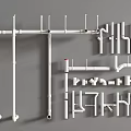 White Plumbing Pipes and Different Types of Fittings Arranged on Gray Background