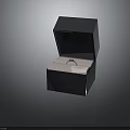 Stylish Fashion Ring Accessory Inside Open Box With Dark Exterior And White Lining 3d model