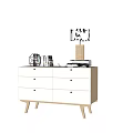Modern White Filing Cabinet With Multiple Drawers And Decorative Items On Top