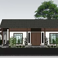 Traditional Chinese House Featuring Classic Tiled Roof Wooden Door Carved Windows and Green Plants