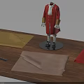Red Tailored Coat on Mannequin with Colored Fabrics and Measuring Ruler