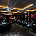 Luxurious KTV Interior Design With Black Leather Sofas Blue Lighting Chandeliers And Wall Screens