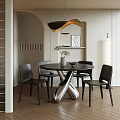 Modern Restaurant Interior With Arched Decor Round Black Table Silver X Legs And Black Chairs