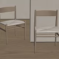 Minimalist Wooden Dining Chairs With White Woven Seats And Light Wall Background
