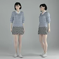 Woman in Gray Sweater With White Collar and Black White Checkered Skirt on Gray Background