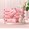 Pink Baby Wipes With Stacked Packaging And White Rabbit Toy