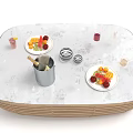 Oval Table With White Patterned Surface Wooden Woven Edge Fruit Plates Metal Bucket Glass Cups