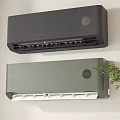 Wall Mounted Air Conditioner Fans Black And Gray Installed On White Wall With Green Plant