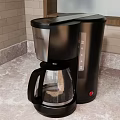 Black Coffee Maker with Glass Carafe and Automatic Brew Function on Kitchen Countertop 3d model
