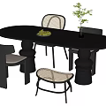 Modern Black Oval Dining Table Set With Woven Chairs Stool Fruit Bowl And Potted Plant