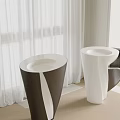 Modern Black and White Washbasin with Unique Shape on Herringbone Wooden Floor