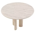 Round Natural Oak Dining Table With Cylindrical Legs And Smooth Surface In Modern Design