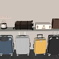 Colorful Rolling Luggage Cases and Designer Handbags on Minotti Shelf
