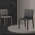 Modern Light And Dark Upholstered Single Chairs With Sleek Design On White Display Platform