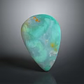 Polished Turquoise Stone Teardrop Ornament With Yellow Spots And Smooth Glossy Surface
