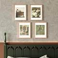 Four Gold Framed Picture Frames Hanging On Gray Textured Wall With Artworks 3d model