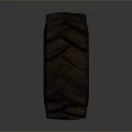 Heavy Duty Black Tire With Deep Tread Blocks On Gray Background