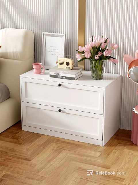 White Two Drawer Storage Cabinet Topped With Pink Mug Books Radio And Pink Flower Vase 3d model 