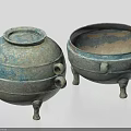 Two Antique Ceramic Vessels With Textured Surface Handles Lidded Design And Tripod Feet