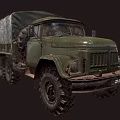 Vintage Green Military Truck With Canvas Covered Cargo Bed And Large Off Road Tires