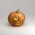 Decorative Ornament Set featuring carved pumpkin lantern with glowing face for Halloween decoration