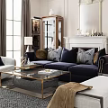 Elegant Modern Living Room Interior With Navy Sofa Glass Coffee Table Fireplace And Decorative Mirror