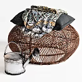 Woven Rattan Coffee Table With Decorative Blanket Gray Pillows And Vintage Watering Can