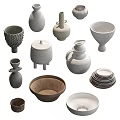 Assorted Ceramic Vessels Bowls Plates Vases and Lidded Containers in Gray White Brown Natural Tones
