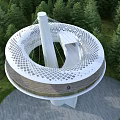 White Spiral Tower With Round Observation Deck And Cable Stayed Structure In Forest