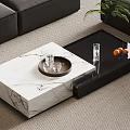 Modern Coffee Table With Marble And Black Glass Top Tray Glass Cups And Oranges